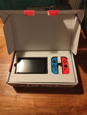 Nintendo Switch inkl. Originalverpackung + Zubehörpaket + 2 Spiele
