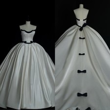 Elegant Satin Wedding Dress With Bow Strapless Sweep Train Princess Bridal Gowns