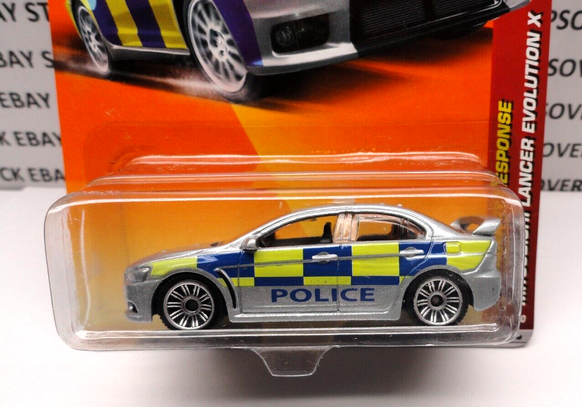 2011 MATCHBOX SILVER MITSUBISHI LANCER EVOLUTION X POLICE CAR, #57
