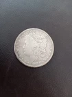 1881 Morgan silver dollar