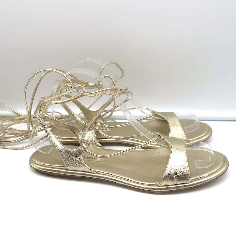Sandalias de gladiador planas envolventes al tobillo Miu cuero dorado metálico talla 38,5 Foto 2 de 4