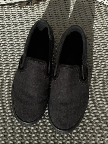 VANS Furgoni classici fuori muro grigio salta