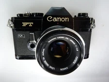 VINTAGE CANON FT-QL FILM CAMERA black with CANON  FL 50/1.8 lens.READ
