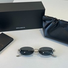 Gentle Monster Statement Rimless Sunglasses Oval Dark Lens Silver Metal Temples