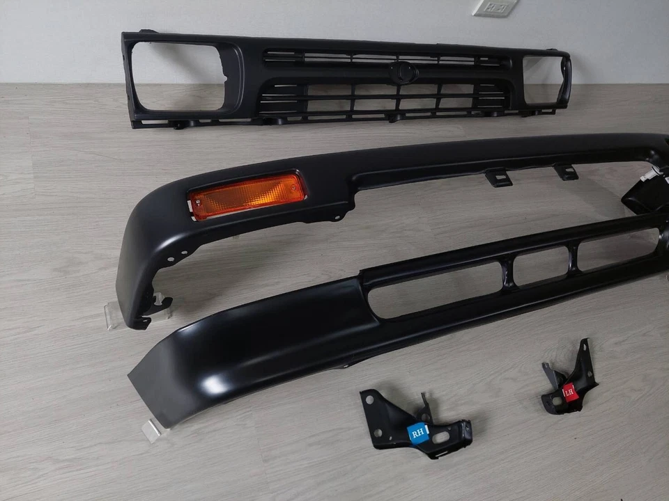 Luz de giro de cenefa de barra de parachoques delantera de rejilla para camioneta Toyota 1992-95 2x2 negra Foto 3 de 4