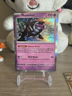Munkidori 044/131 Sv: Prismatic Evolutions Holo