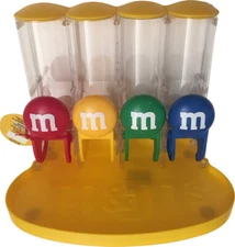 M&M's World Four Tube Yellow Candy Dispenser New with Tags