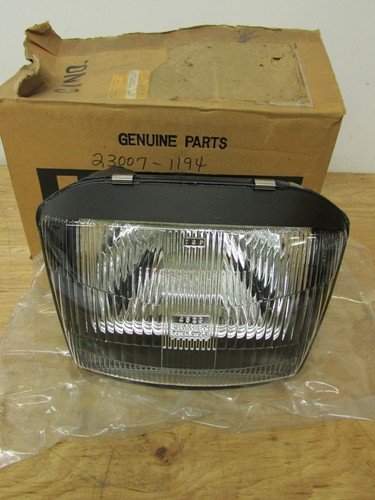 NOS 86-07 KAWASAKI EX250 NINJA 250R 250 OEM HEADLIGHT HEAD LAMP ASSY 23007-1194 - Picture 1 of 2