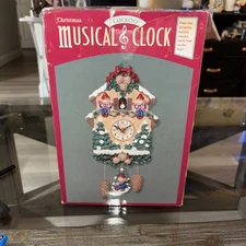 NIB Vintage MUSICAL CHRISTMAS CLOCK plays XMAS Songs each Hour