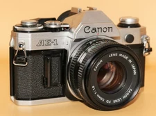 Canon AE-1 35mm SLR Camera Kit w/ FD 50mm f/1.8 Lens - Tested Excellent + Extras