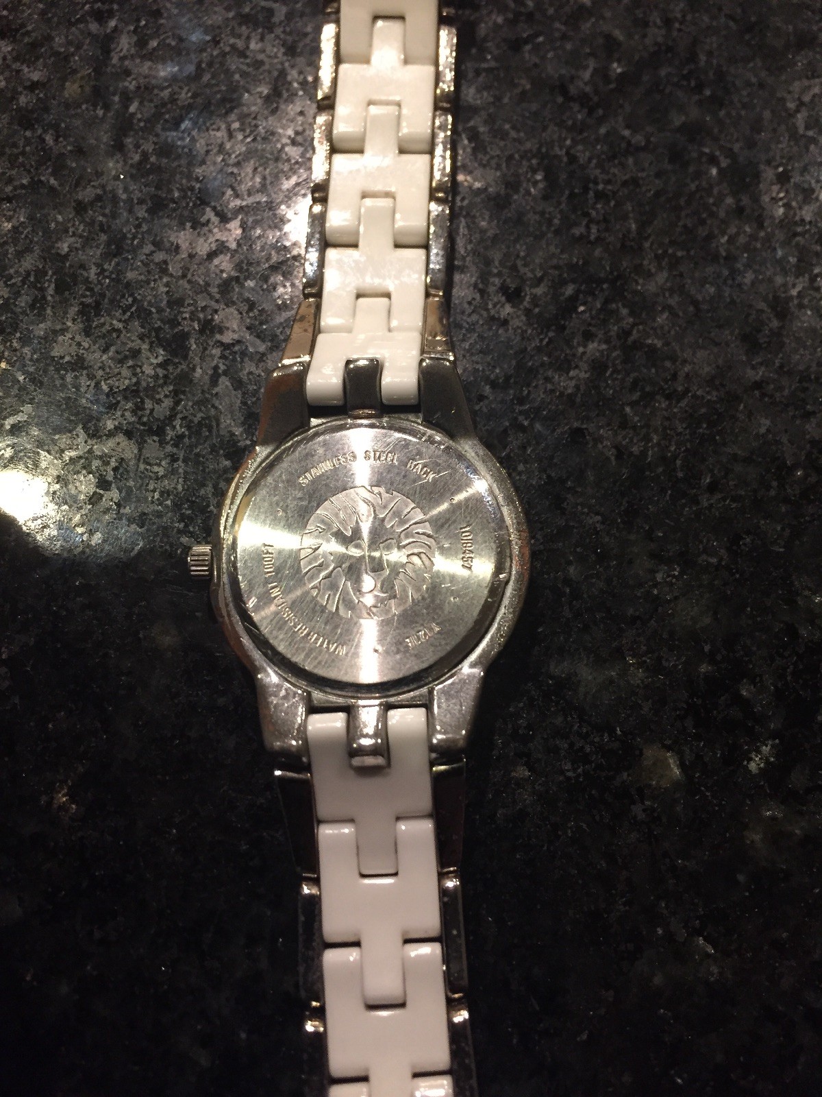 Anne Klein Women's White Ceramic Wrist Watch Y121E diamond Bezel and