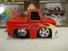 MGA Entertainment Car Tuned '87 Chevy C10 with Flames Pro Street