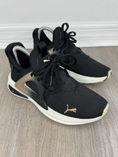 PUMA Soft Ride Enzo Evo Molten Women  s 6.5 Black Gold Athletic Shoes