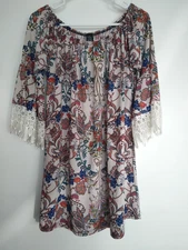 Sz L/XL white tunic w/ multi color floral print by Win Win. Excellent condition