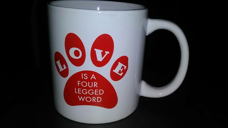 Coffee Mug "LOVE IS A FOUR LEGGED WORD" Great for the pet lover! Brand New!
