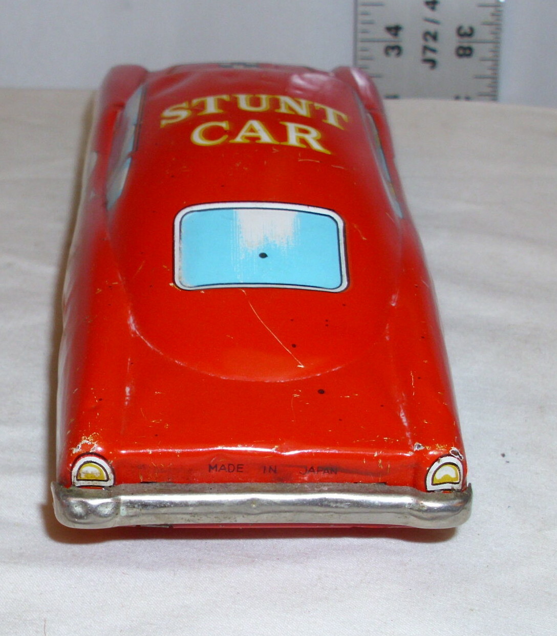 A 1960s Japanese M101 Aston Martin Secret Ejector car with original Bond and Villain figure and orig