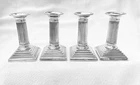 SET OF FOUR STERLING SILVER COLUMN CANDLESTICKS - Wm Hutton,London, 1897/98.