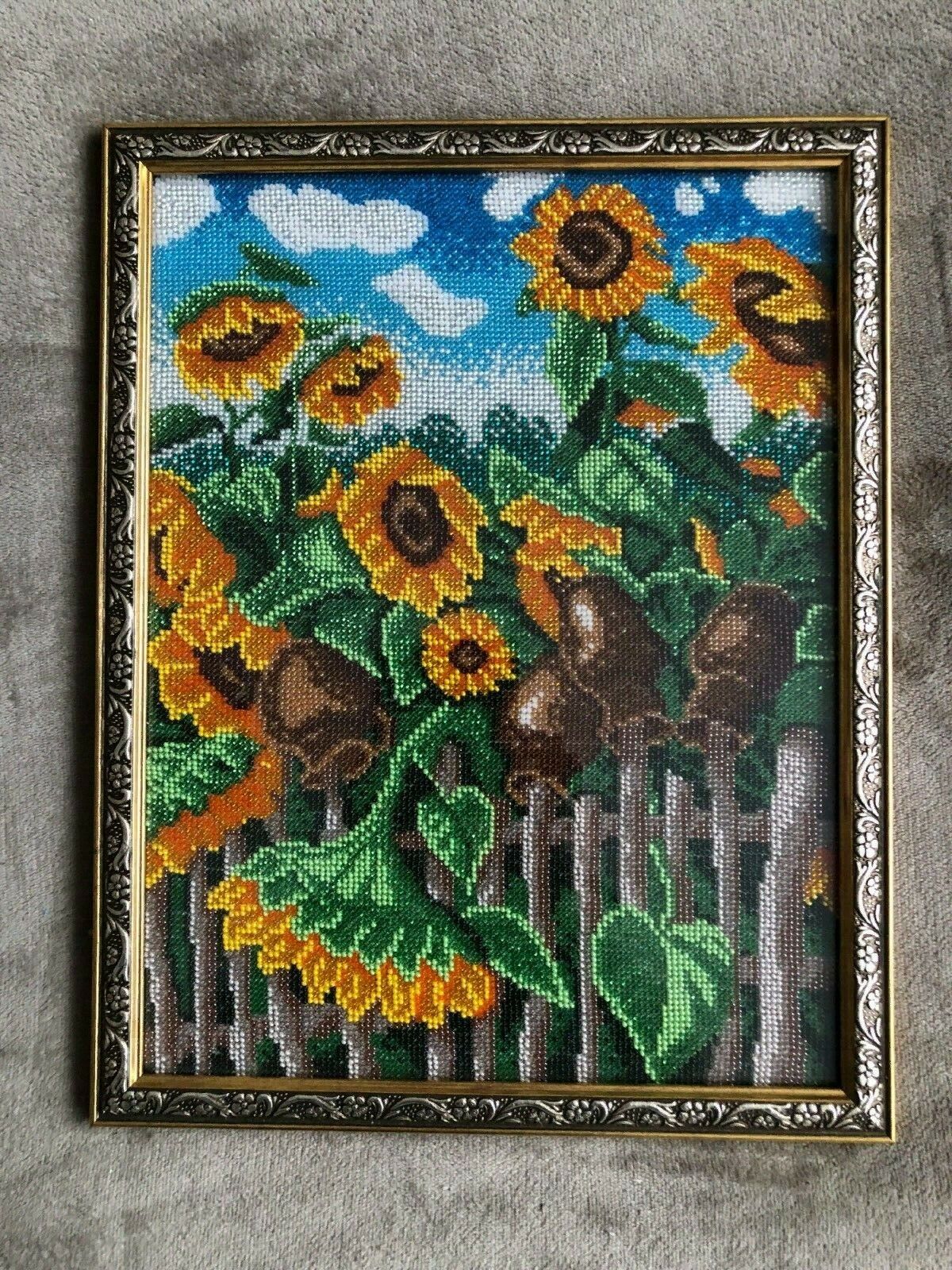 The picture is embroidered with beads