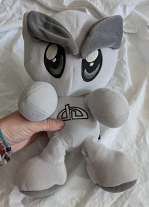 official original DeviantArt Fella plushie who traveled around the world