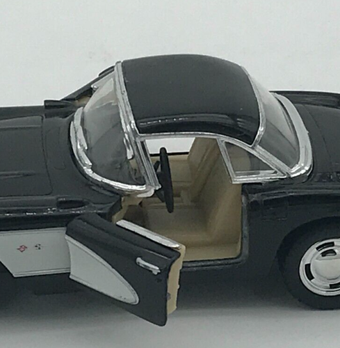KINSMART 1957 Chevrolet Corvette Jet Black & White 1/34 Scale Diecast Car - Picture 3 of 12