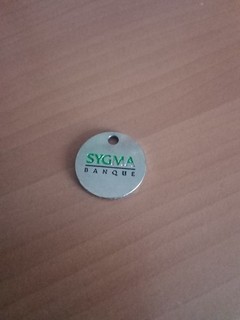 jeton de caddie Banque Sygma