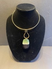 Gold ring choker with geen and black stone