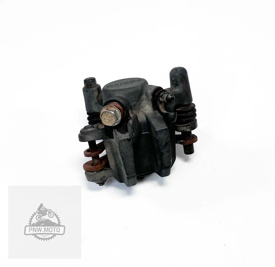 2003 Suzuki RM85 RM 85 85L OEM FRONT BRAKE CALIPER PISTON BRACKET - Image 2 of 4