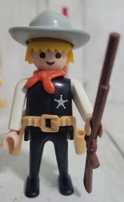 LOT OF 3 PLAYMOBIL FIGURES. 1 SHERIFF 1 COWBOY 4 RAFFLES RACK