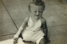Crying Baby Sitting On Sidewalk B&W Photograph 3 x 4.5