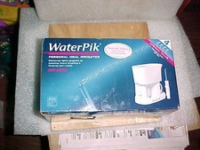 NOWOŚĆ W PUDEŁKU Waterpik Family System do czyszczenia jamy ustnej Irygator zębów Flosser