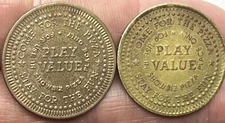 Two VINTAGE SHOWBIZ PIZZA PLACE TOKENS different types now CHUCK E CHEESE