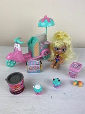 Shopkins bundle: Gelati ice-cream Scooter; Sandy Shores doll; Scoopers