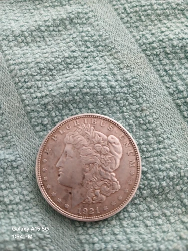 1921 $1 Morgan Silver Dollar, circulated but in good condition