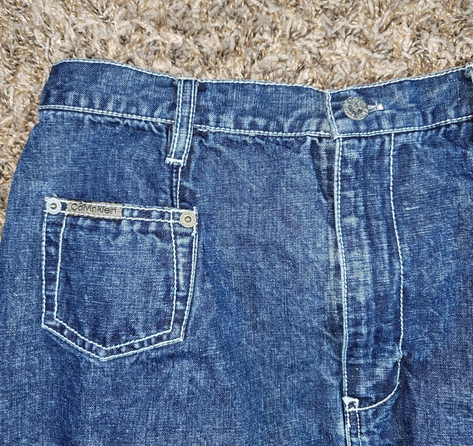 Falda vintage para mujer Calvin Klein 10 bolsillos de algodón lavado oscuro de mezclilla azul Foto 2 de 4