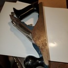Vintage blackhawk C557MP wood hand plane with worn silver blade and blue handle, flat rectangular wood base.