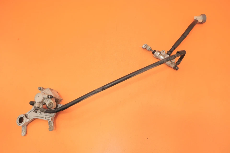 97-99 CR250R CR250 1997 OEM pinza de freno trasera soporte cilindro maestro manguera Foto 2 de 4