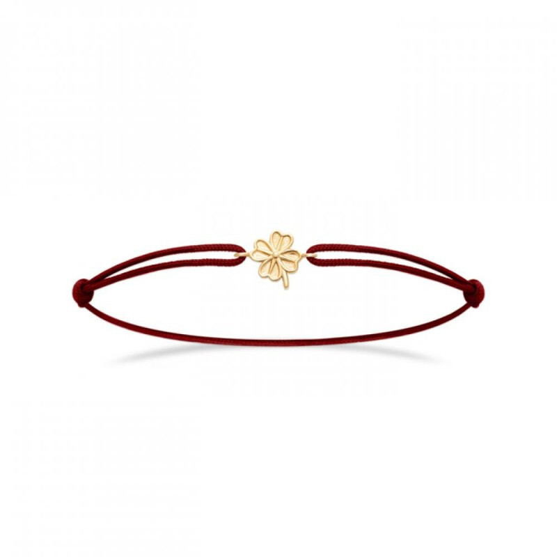 Bracelet trèfle or 18 carats et cordon rouge ajustable, l'excellence de l'artisanat