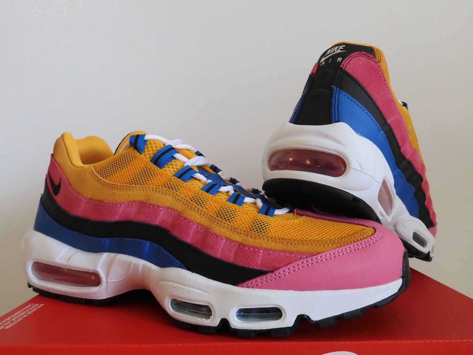 pink yellow and blue air max