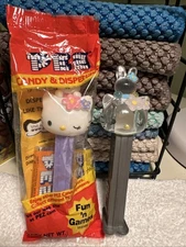PEZ Hello Kitty Sanrio Wink Kitty Crystal Gray Stem 4.9 Solid Purple Stem 4.9