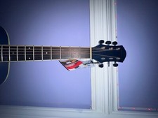 Guitar. Practically New. Price Negotiable 