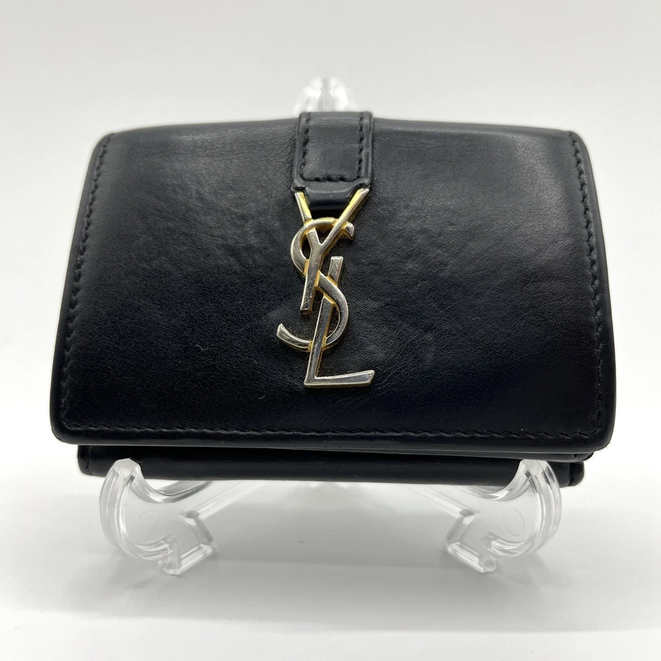 Cartera YSL Cuero Cassandra Negra Yves Saint Laurent Tríptica Automática de Japón Foto 2 de 4