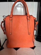 large orange faux leather handbag