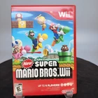 New Super Mario Bros. Wii Nintendo Game+Case+Manual Tested 2009 ESRB E 🎮