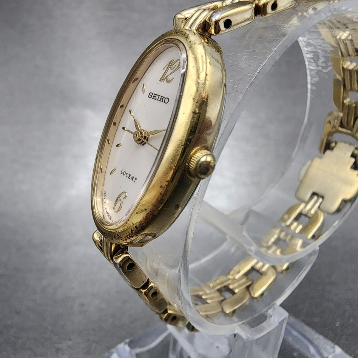 Seiko Lucent Watch Women 15mm Champagne Dial Gold Tone Oval