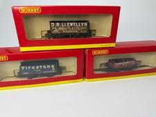 HORNBY R6392 OPEN PLANK WAGONS TRIPLE PACK. FACTORY WEATHERED