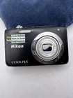 Nikon Coolpix S2600 14MP Digital camera  good Working, curtain doesn’t work