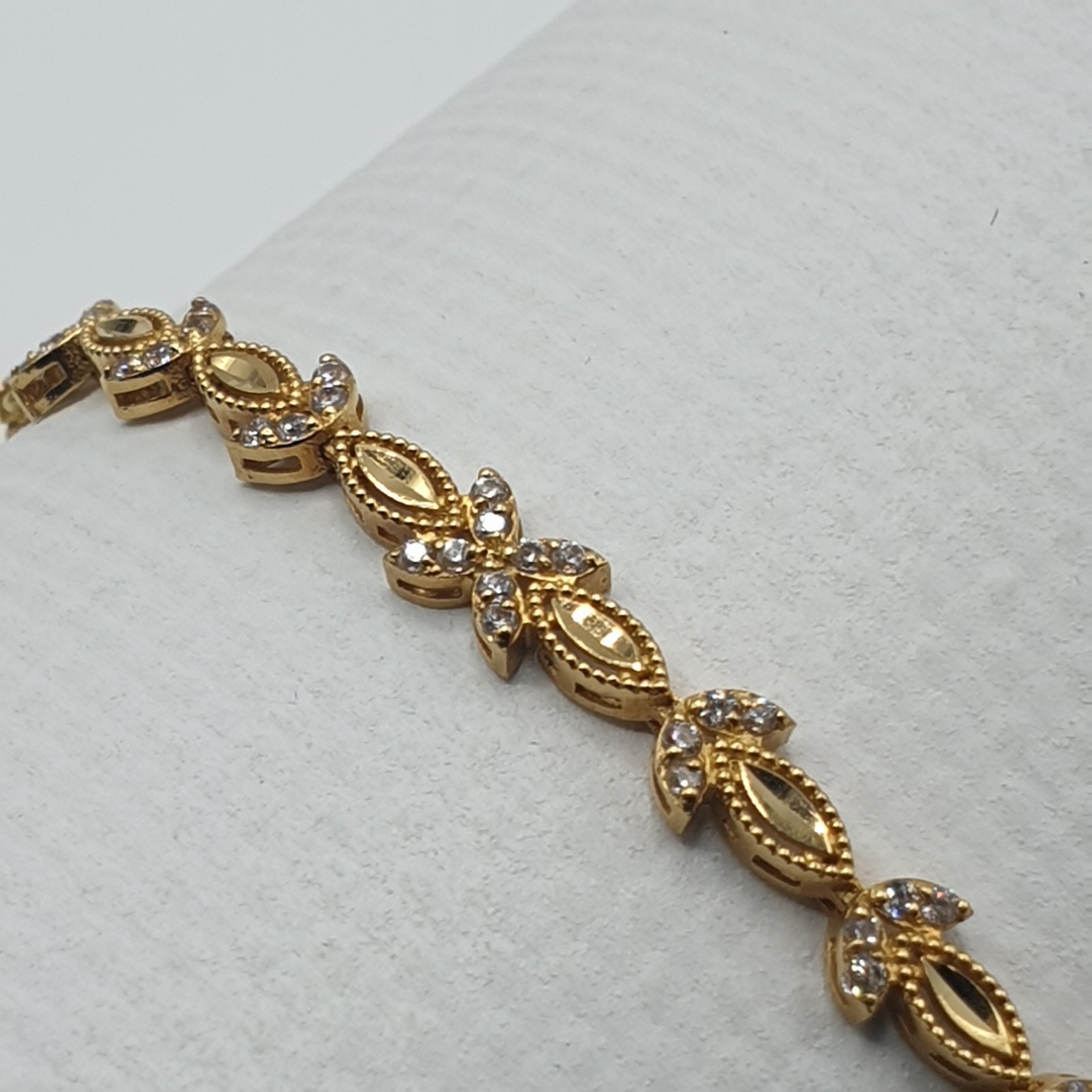Bracelet Feuillage en or 18k 750 pour femme serti de zircons scintillants
