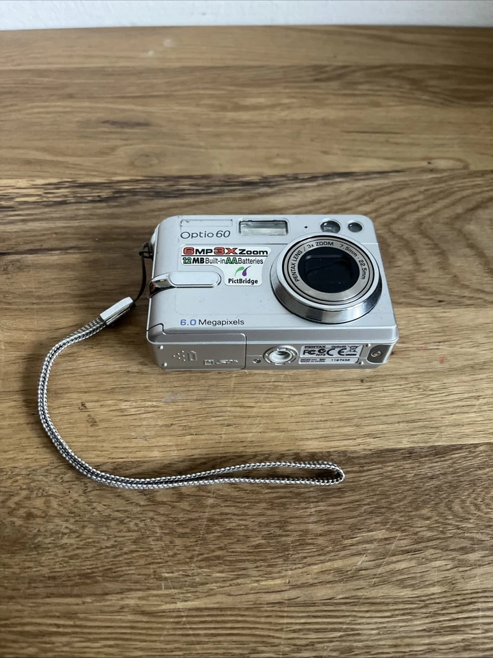 Pentax Optio 60 Digitalkamera 6.0MP mit Zubehörpaket: Anleitung / SD 256MB - Bild 2 von 4