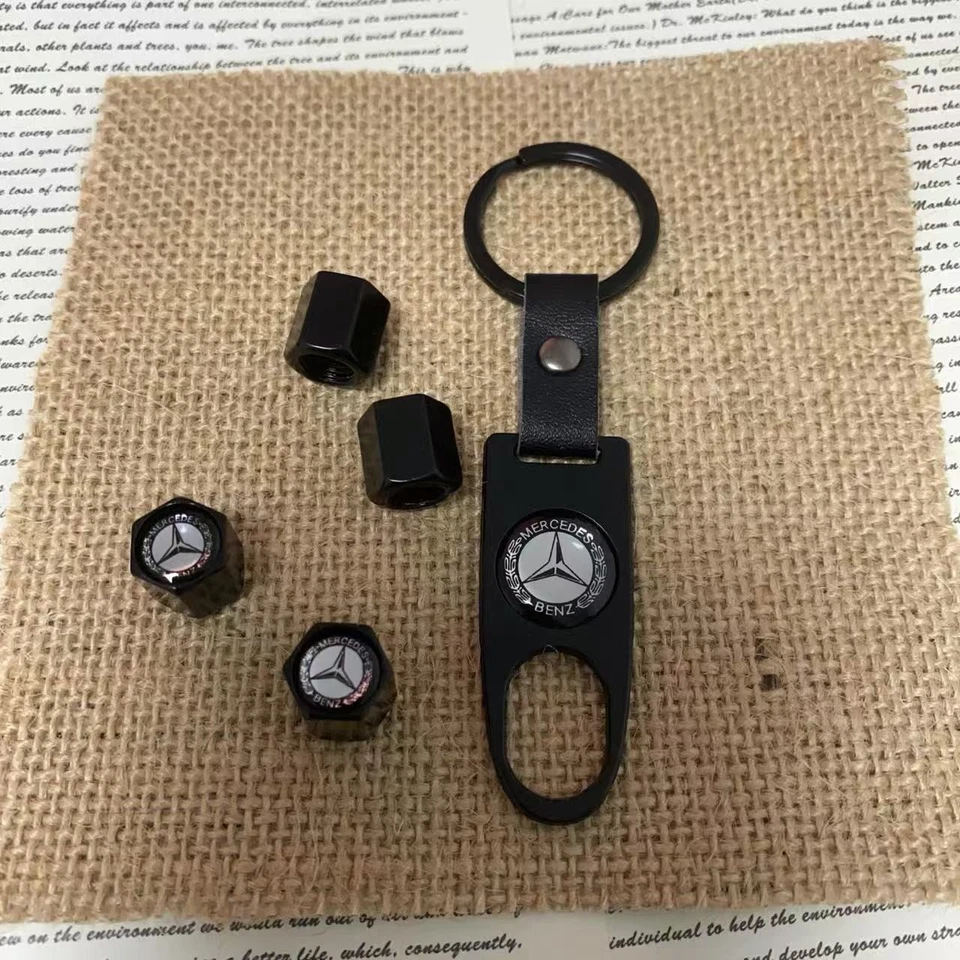 Tapa de vástago de válvula de neumático con cubierta antipolvo y llavero de metal para Mercedes-Benz Foto 2 de 3