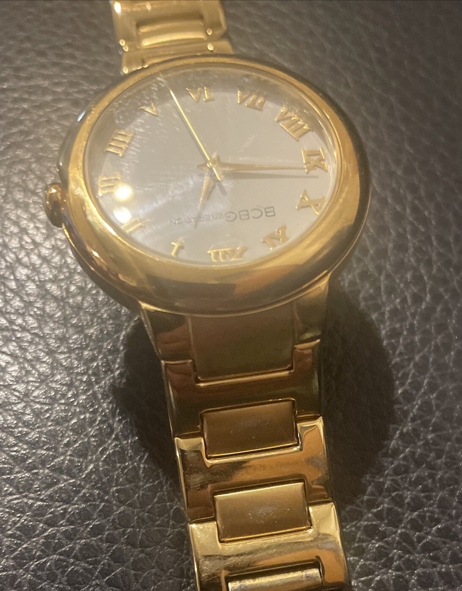 Women's BCBGeneration Gold Tone BCBG Watch some worn scraps on bracelet View 3